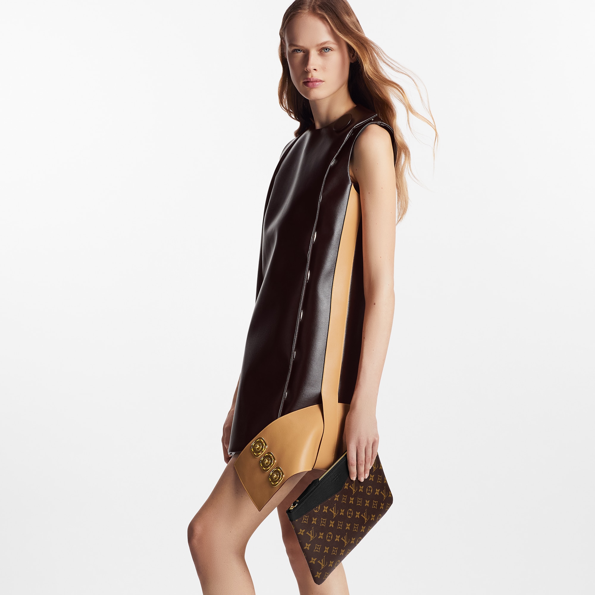 Daily Pouch Monogram Canvas in Women