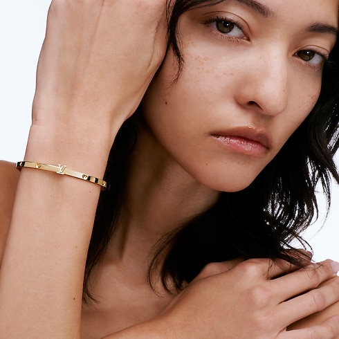 Empreinte Small Bangle, Yellow Gold in Jewelry's Categories Bracelets collections by Louis Vuitton (Product zoom)