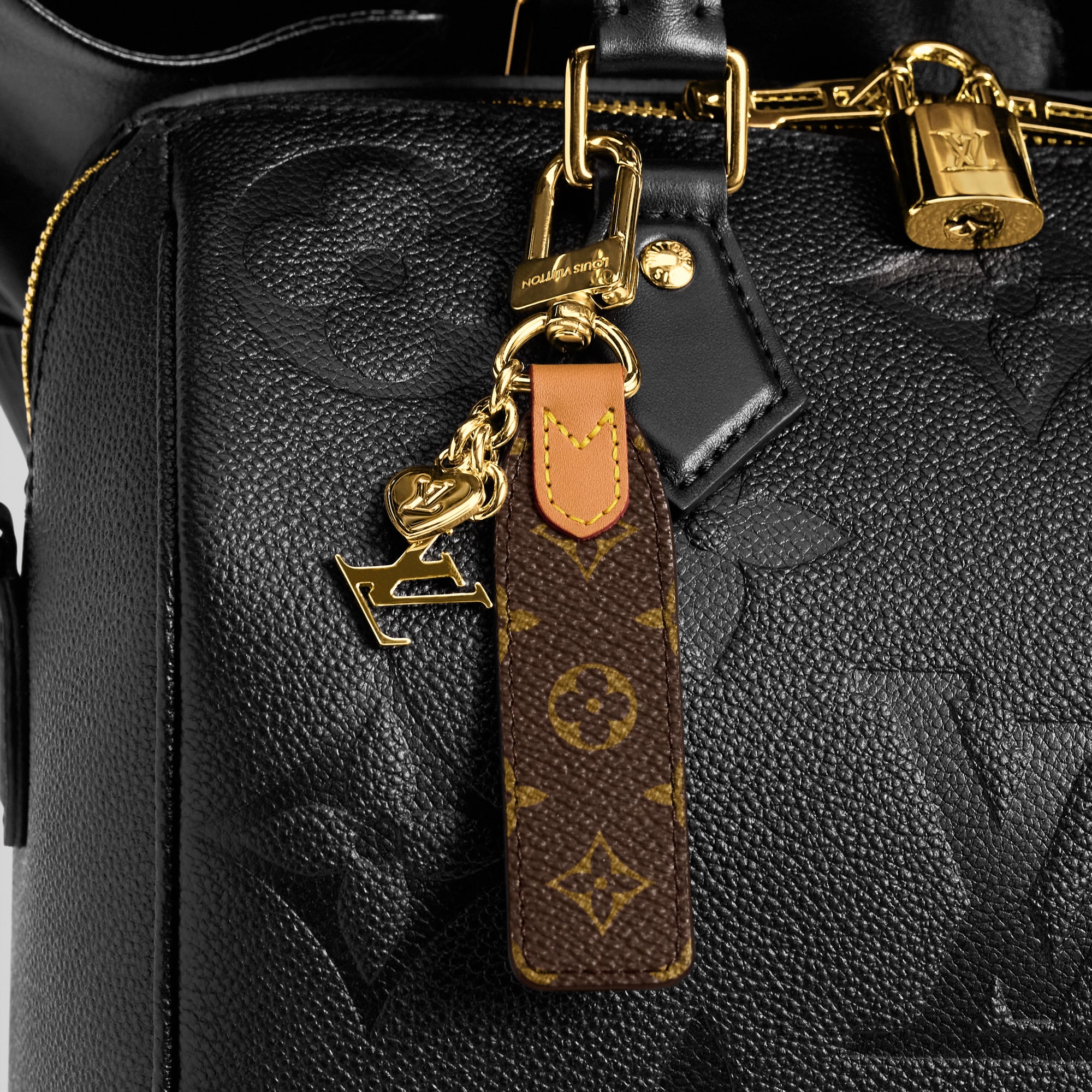 LV Cherished Tab Key Holder S00 in Women
