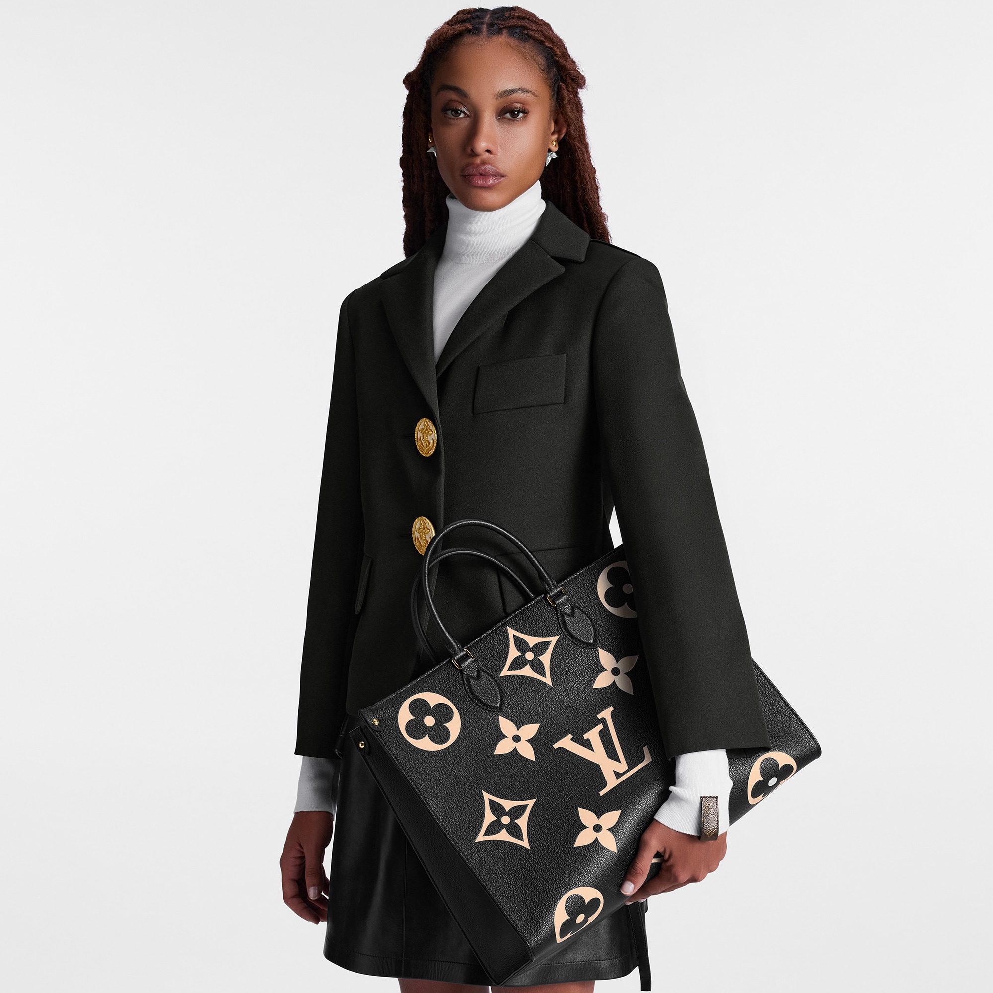 OnTheGo GM Bicolor Monogram Empreinte Leather in Women