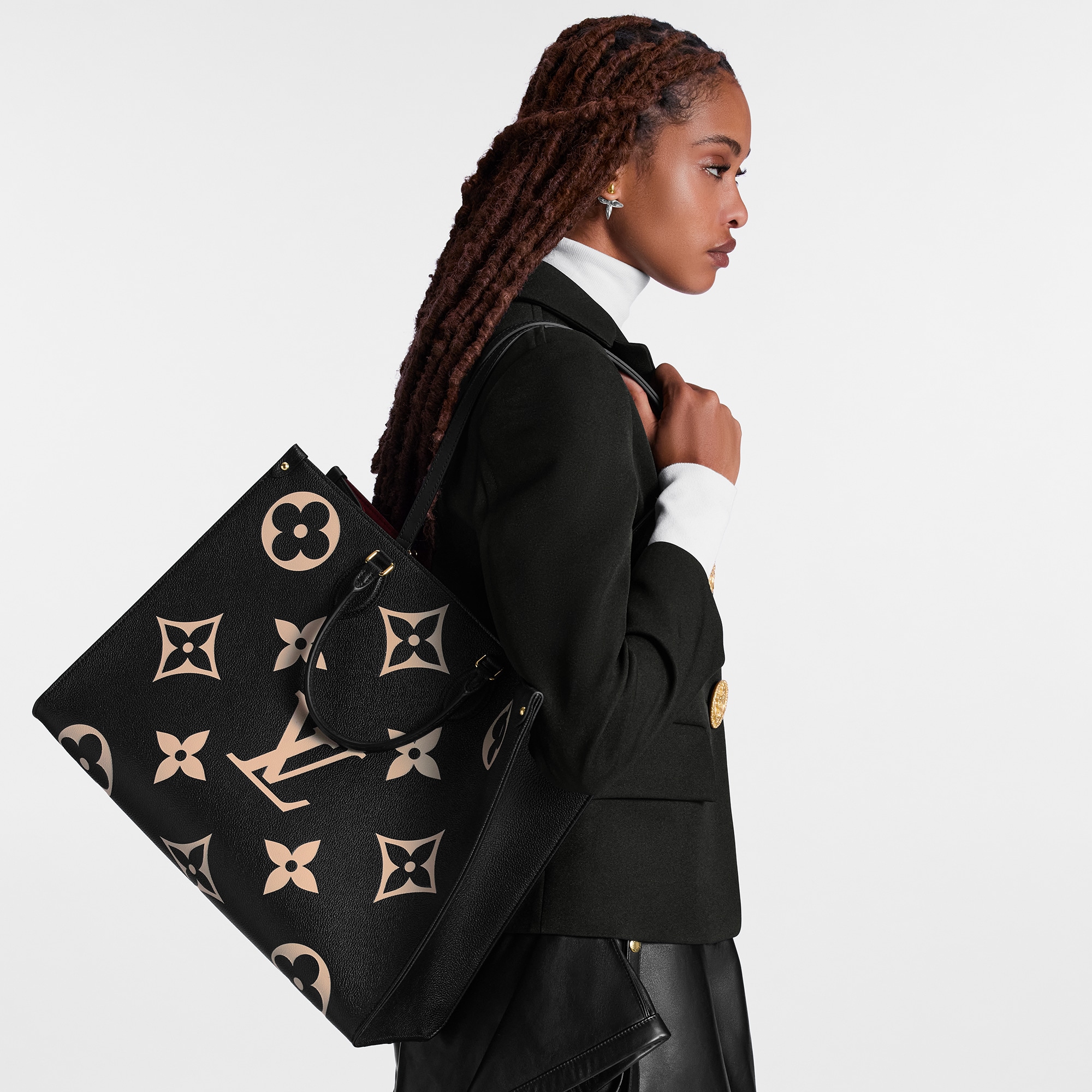 OnTheGo GM Bicolor Monogram Empreinte Leather in Women