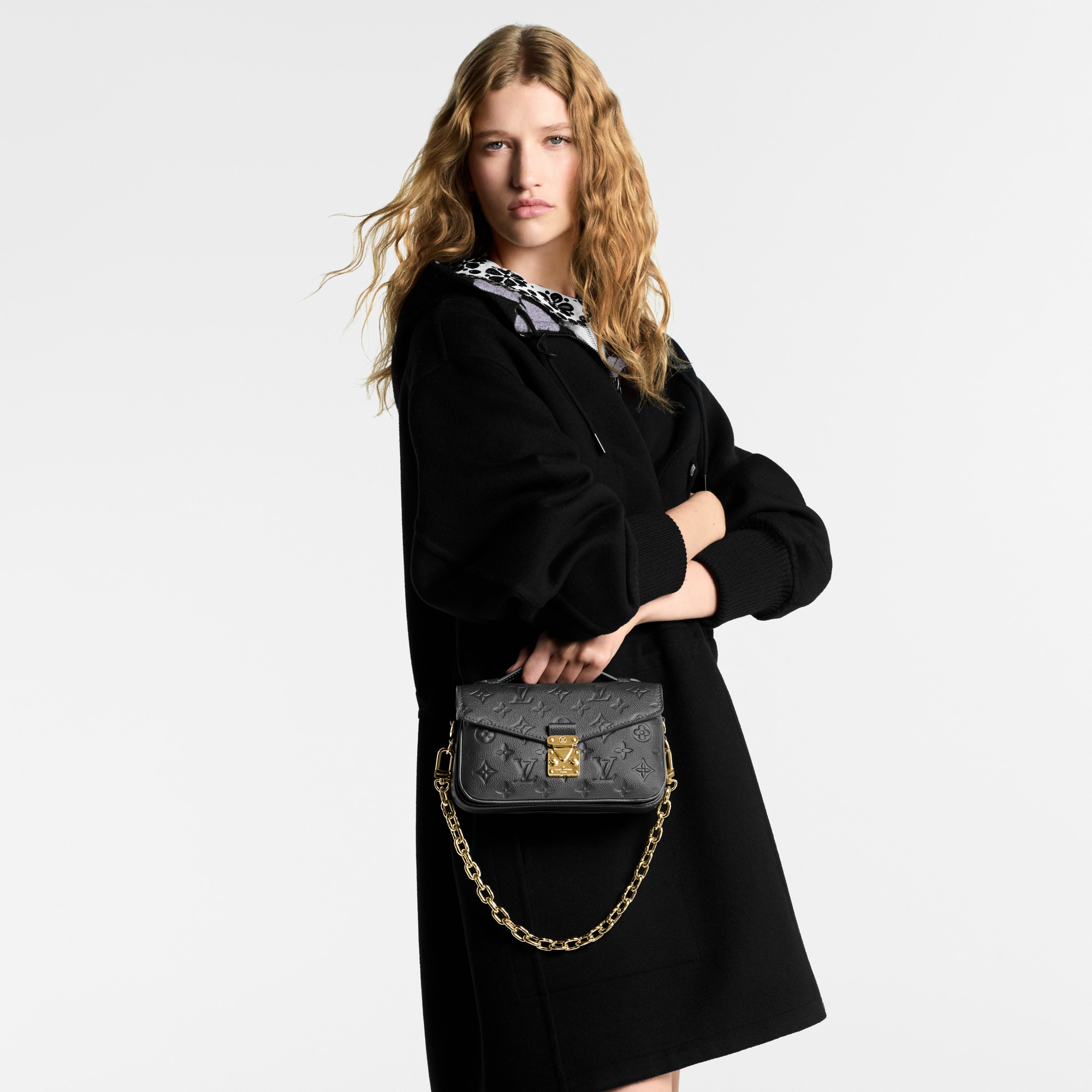 Pochette Métis East West Monogram Empreinte Leather in Women