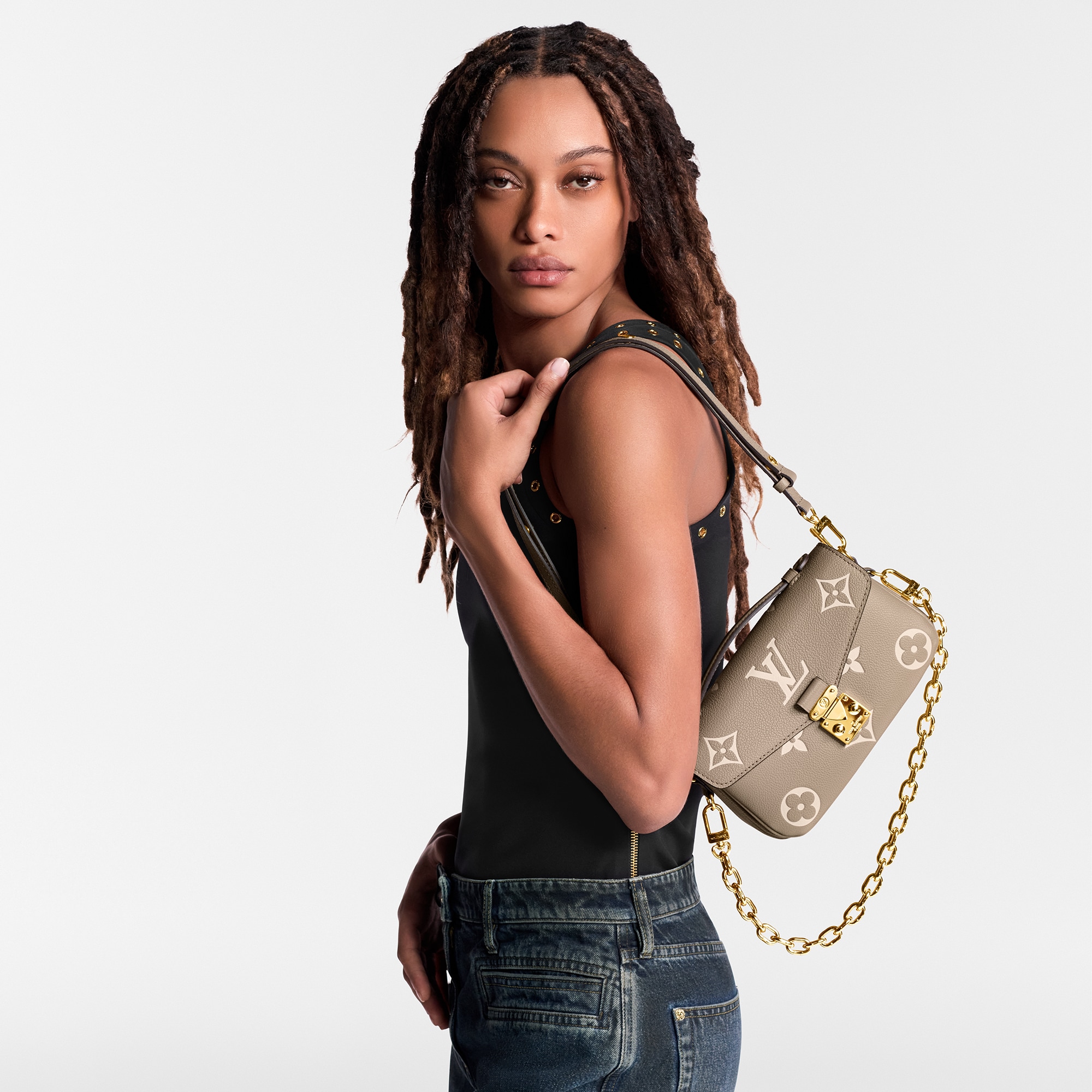 Pochette Métis East West Monogram Empreinte Leather in Women