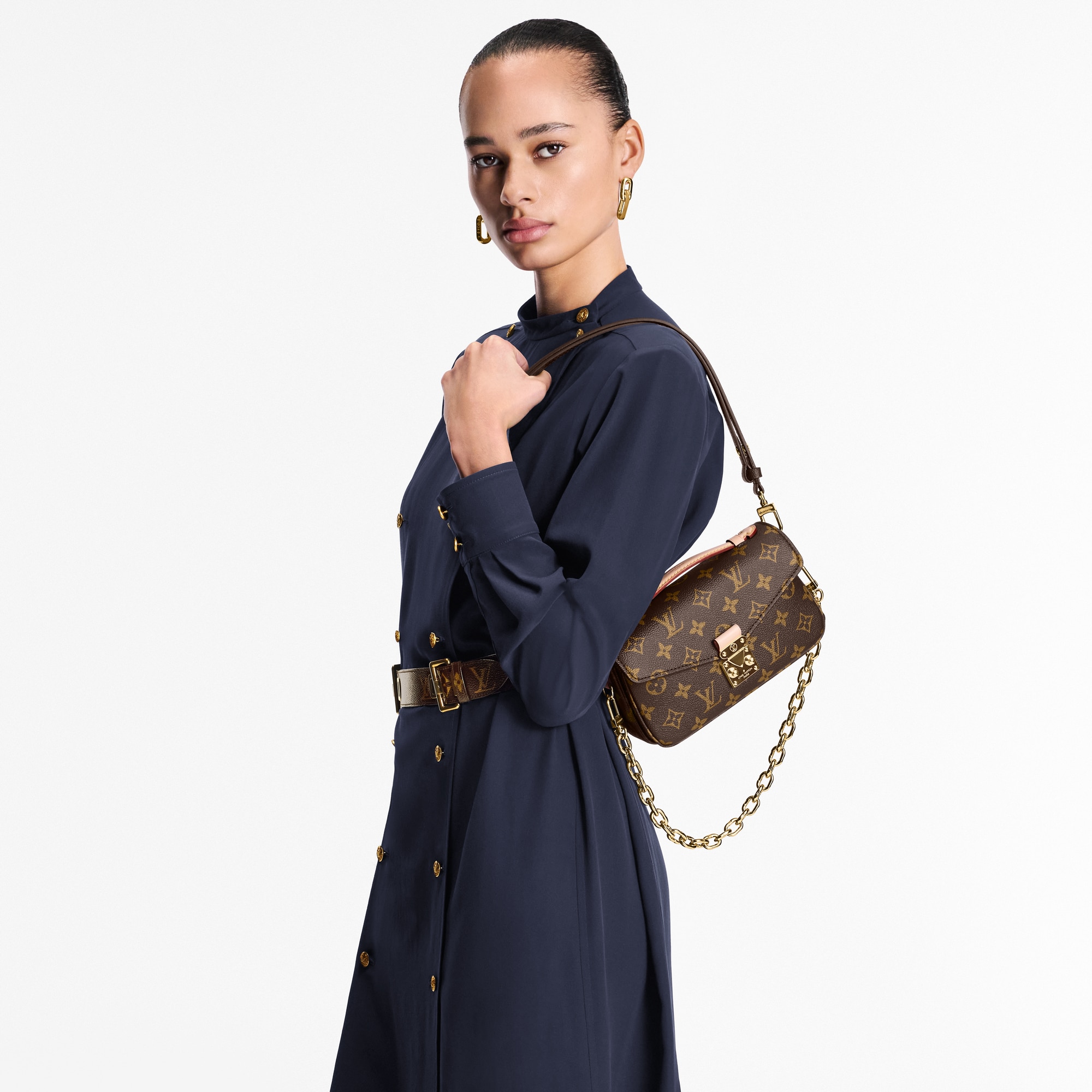 Pochette Métis East West Monogram Canvas in Women